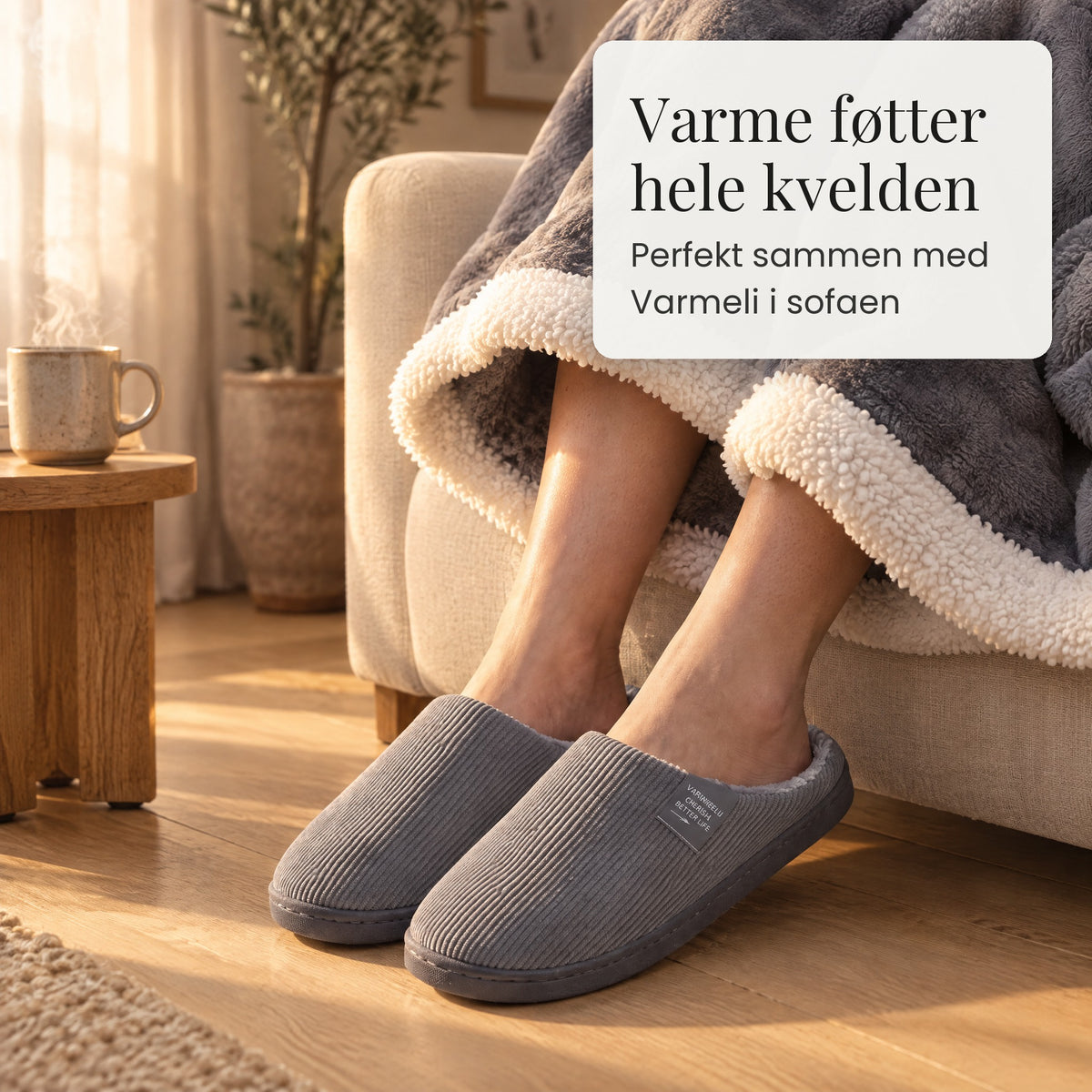Kosetøfler sammen med Varmeli-pleddet i sofaen